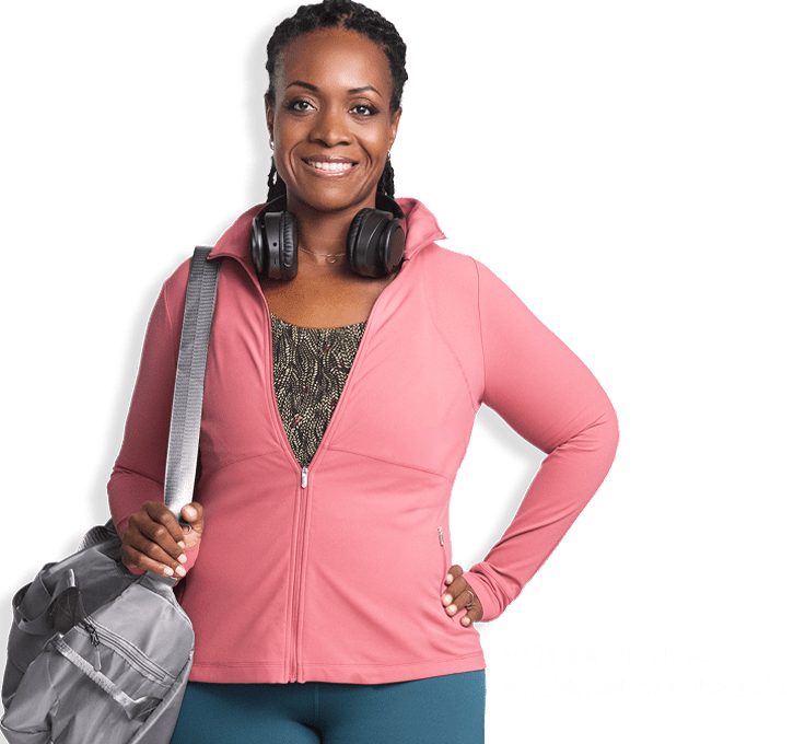 Maija, a paid Novo Nordisk spokesperson with headphones around her neck