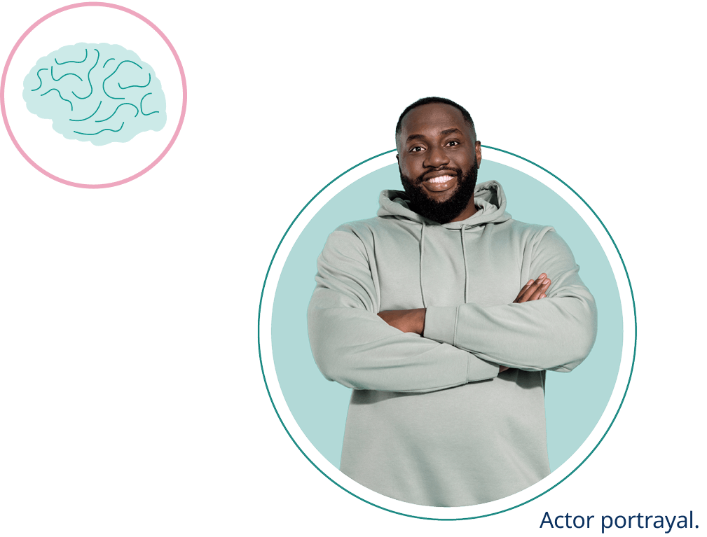 Man with facial hair in sweatshirt with his arms crossed and a brain icon