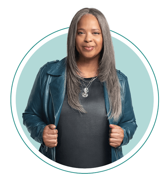 Lisa wearing jean jacket and gray shirt