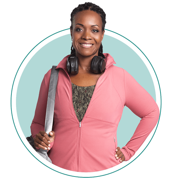 Maija wearing pink sweatshirt and purse